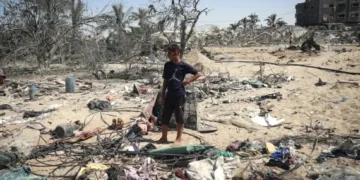 A Palestinian at the site of Israeli strikes on a displacement camp in the al-Mawasi area in southern Gaza.