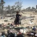 A Palestinian at the site of Israeli strikes on a displacement camp in the al-Mawasi area in southern Gaza.