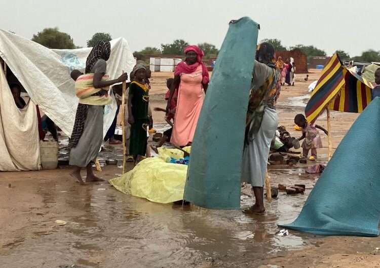 Refugees build makeshift shelters during the rainy season in Adre, eastern Chad.