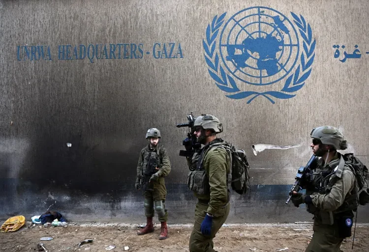 Sweden Decides To End UNRWA Funding 1 Israeli soldiers operate next to the UNRWA headquarters in the Gaza Strip, in February 2024.