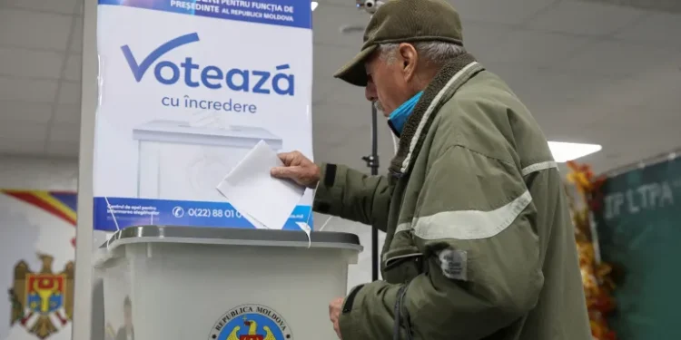 A man votes in Chisinau, Moldova.