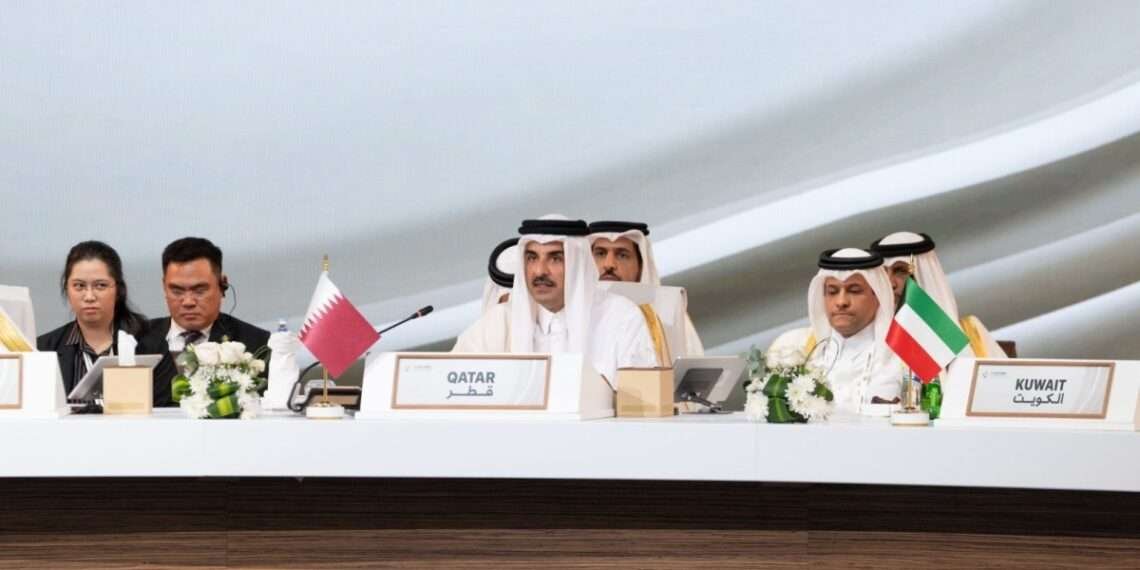 Emir of Qatar, Sheikh Tamim bin Hamad Al-Thani (center)