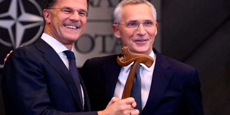 Rutte Takes Over As NATO Head 1 Outgoing NATO Secretary General Jens Stoltenberg (R) and incoming NATO Secretary General and former Dutch Prime Minister Mark Rutte (L) at the handover ceremony, at NATO Headquarters in Brussels, on October 1, 2024.