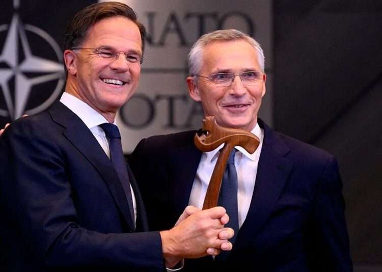 Outgoing NATO Secretary General Jens Stoltenberg (R) and incoming NATO Secretary General and former Dutch Prime Minister Mark Rutte (L) at the handover ceremony, at NATO Headquarters in Brussels, on October 1, 2024.