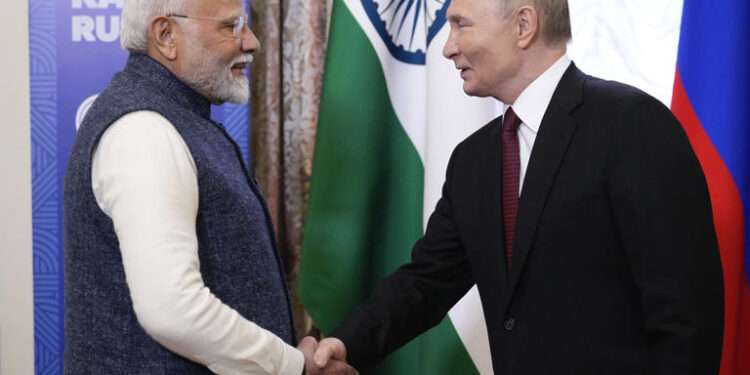 Russian President Vladimir Putin, right, and Indian Prime Minister Narendra Modi shake hands during their meeting on the sidelines of BRICS Summit at Kazan Kremlin in Kazan, Russia, Tuesday, Oct. 22, 2024.
