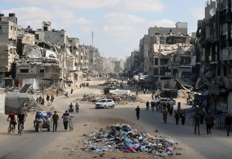 Israel’s War Sets Gaza’s Development Back By Nearly 70 Years 1 Palestinians carry their belongings as they flee areas north of Gaza City in the northern Gaza Strip.