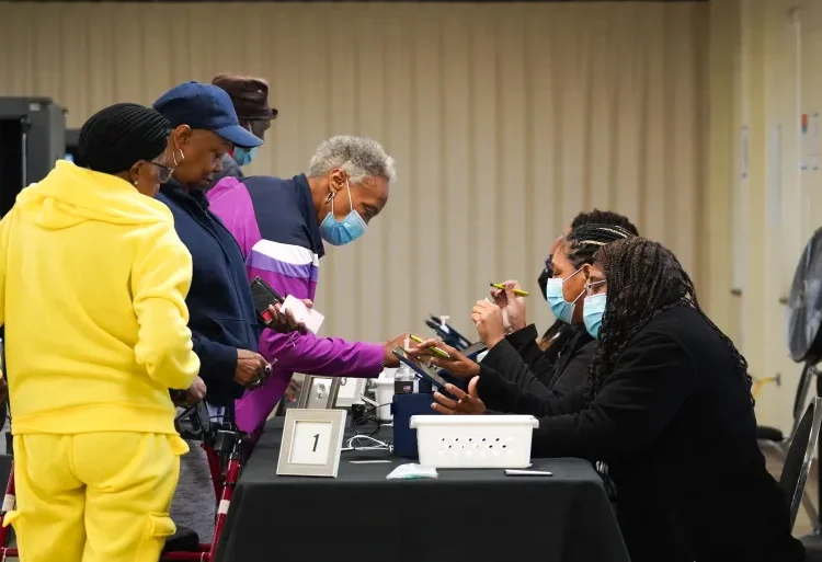 Georgia Signals Record Voter Enthusiasm 1 People sign in to cast their votes on the first day of early voting at East Point First Mallalieu United Methodist Church in Atlanta, Georgia.