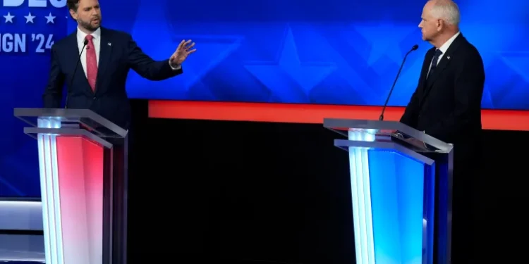Vance, Walz Defend Their Tickets 1 JD Vance, left, and Tim Walz at the Vice Presidential debate.