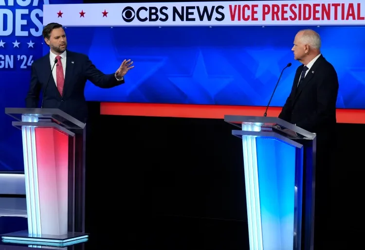 Vance, Walz Defend Their Tickets 1 JD Vance, left, and Tim Walz at the Vice Presidential debate.