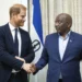 Britain's Prince Harry left, shakes hands with Lesotho's Prime Minister Sam Matekane