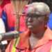 Some Workers of Zoomlion are seen holding brooms during the protest while their leaders voice out their concerns