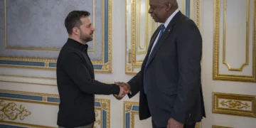 US Secretary of Defense, Lloyd Austin (right) and Ukranian President, Volodymyr Zelenskyy shake hands during their meeting in Kyiv.