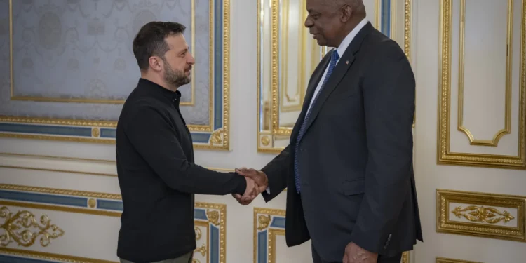 US Secretary of Defense, Lloyd Austin (right) and Ukranian President, Volodymyr Zelenskyy shake hands during their meeting in Kyiv.