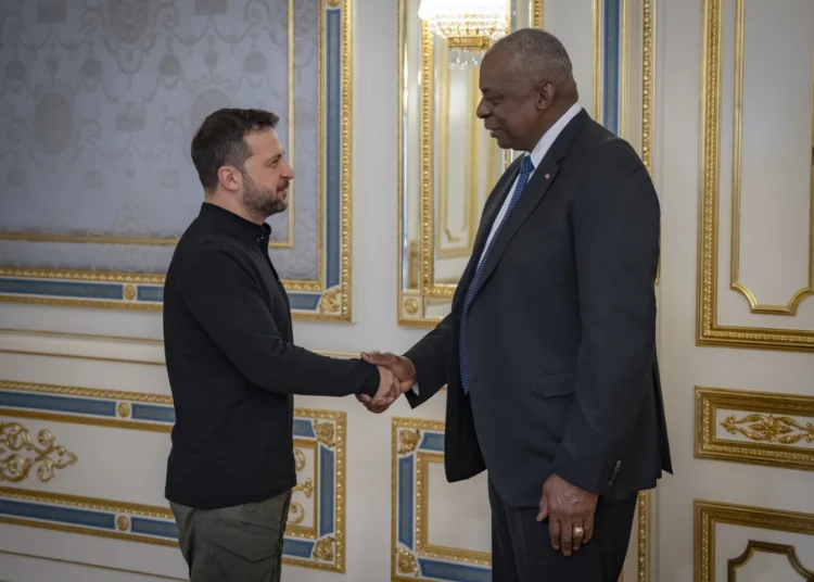 US Secretary of Defense, Lloyd Austin (right) and Ukranian President, Volodymyr Zelenskyy shake hands during their meeting in Kyiv.