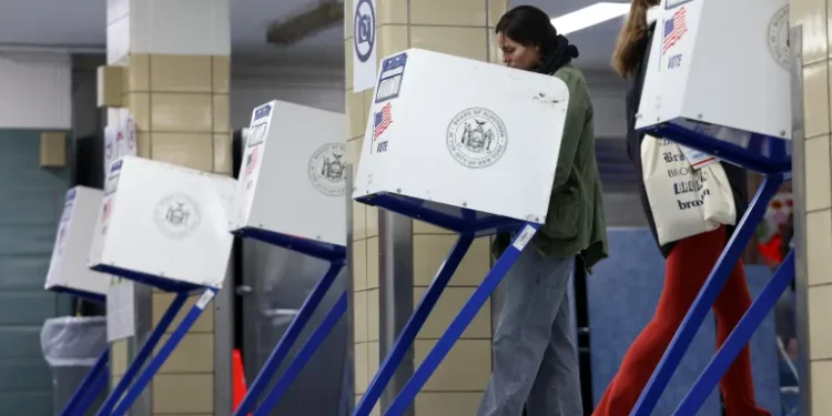 U.S Election Day In Full Swing 1 A person votes at PS20 Anna Silver Elementary School on Election Day for the 2024 US presidential election in Manhattan, New York City.