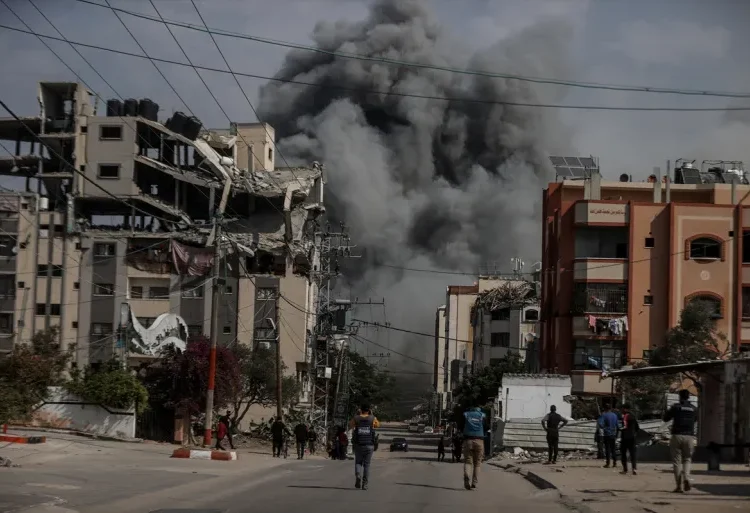 A huge plume of smoke after an Israeli attack on the Nuseirat refugee camp, in central Gaza.