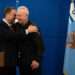 Incoming Defense Minister, Israel Katz (L) embraces Yoav Gallant at a handover ceremony in the defense ministry after Gallant was fired from the post, November 8, 2024.
