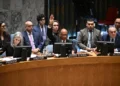 US Alternate Ambassador to the United Nations Robert Wood raises his hand to veto a draft resolution calling for a ceasefire in Gaza.