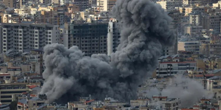 Israeli Cabinet Discusses Hezbollah Ceasefire 1 Smoke rises from the site of Israeli air strikes targeting Beirut's southern suburbs.