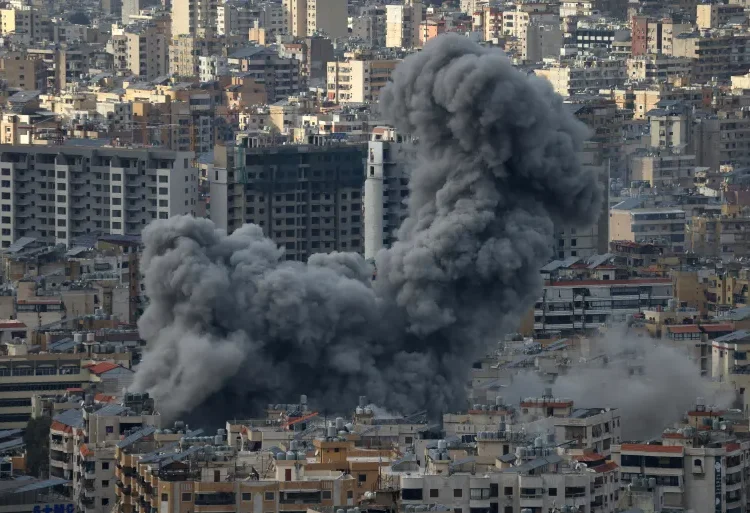 Smoke rises from the site of Israeli air strikes targeting Beirut's southern suburbs.