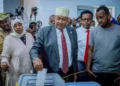 President-elect Abdirahman Mohamed Abdullahi (center) casting his vote in the just ended election