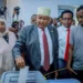 President-elect Abdirahman Mohamed Abdullahi (center) casting his vote in the just ended election