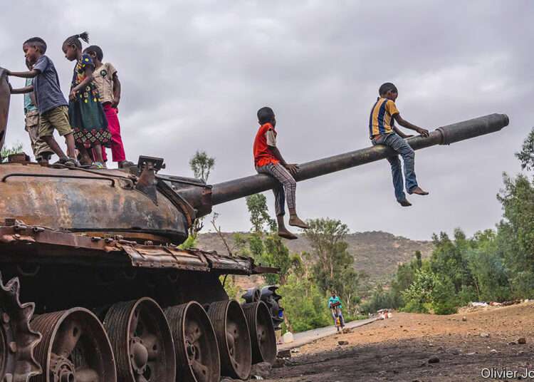 Fragile Peace in Tigray, Two Years After the War 1 Children playing on a destroyed tank in the Tigray region.