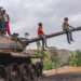Fragile Peace in Tigray, Two Years After the War 13 Children playing on a destroyed tank in the Tigray region.