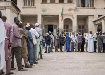 People line up to cast their ballot for legislative elections in Dakar, Senegal, Sunday, Nov. 17, 2024.