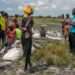 WFP Appeals for $16.9 Billion to Combat Hunger 13 In Rupchai (Unity State), South Sudan, people collect food which was dropped from an airplane