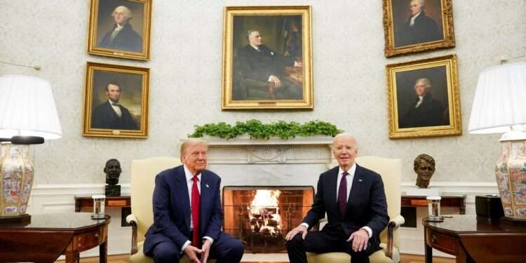 President Joe Biden meets with President-elect Donald Trump in the Oval Office at the White House in Washington, DC, on November 13, 2024.