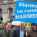 UK Farmers Protest Tax Plan, Warn of Drastic Actions 11 Robert Jenrick poses under a ‘Starmer the farmer harmer’ banner