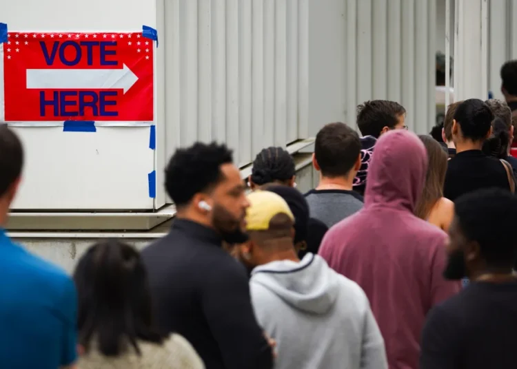 Voters head into a polling location to cast their ballots in Atlanta, Georgia, on November 1.