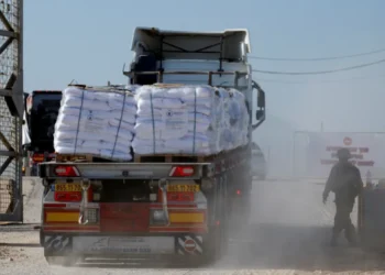 A truck carries humanitarian aid destined for the Gaza Strip at the Karem Abu Salem crossing in southern Israel, November 11, 2024.