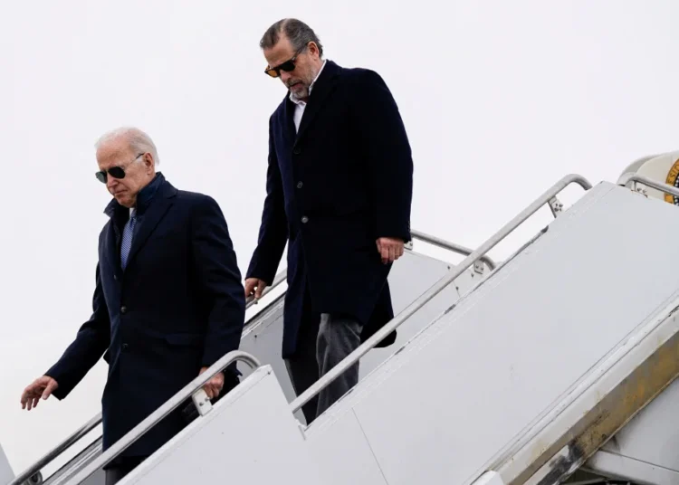 President Joe Biden and his son Hunter Biden disembark from Air Force One in Syracuse, New York, on February 4, 2023.