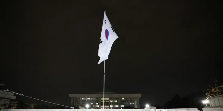 The South Korean flag hangs on a pole outside the gate of the National Assembly in Seoul, December 4, 2024.