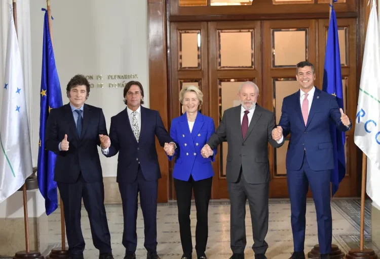 EU, Mercosur Bloc Strike Free Trade Deal 1 Uruguay's President Luis Lacalle Pou poses with European Commission President Ursula von der Leyen, Argentina's President Javier Milei, Brazil's President Luiz Inacio Lula da Silva, Paraguay's President Santiago Pena during a family photo at the Mercosur Summit in Montevideo, Uruguay December 6, 2024.