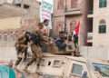 Houthi Attacks Injure 73 In Saudi Arabia 6 Fighters recruited into the Houthi group ride on top of an armoured personnel carrier in a demonstration to show solidarity with Palestinians in the Gaza Strip, in Sanaa, Yemen, August 24, 2024.