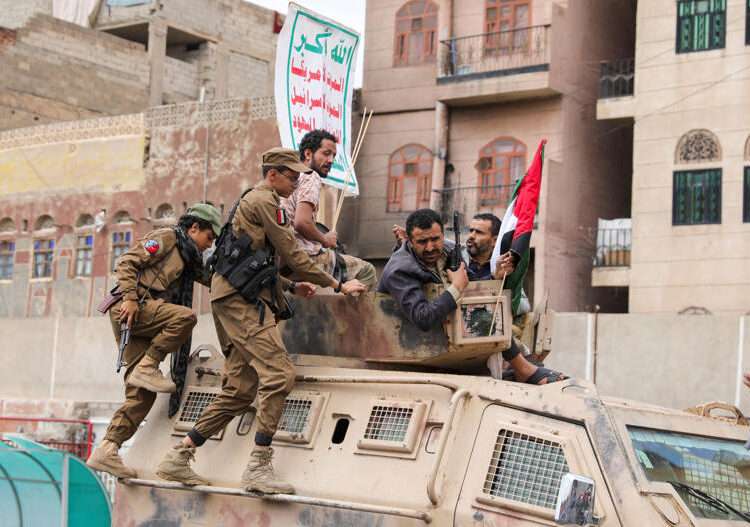 Houthis Defiant As UNSC Urged To Condemn US-Israeli ‘Terrorism’ 1 Fighters recruited into the Houthi group ride on top of an armoured personnel carrier in a demonstration to show solidarity with Palestinians in the Gaza Strip, in Sanaa, Yemen, August 24, 2024.