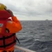 A crewmember on board a Taiwan Coastguard ship monitors a Chinese Coastguard vessel in waters east of Taiwan.