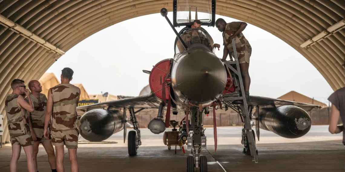French Air Force mechanics maintain a Mirage 2000 on the Niamey, Niger base