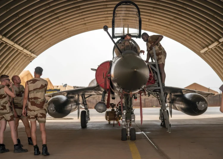French Air Force mechanics maintain a Mirage 2000 on the Niamey, Niger base