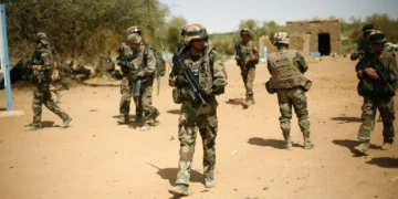 French soldiers secure an area where a suicide bomber attacked