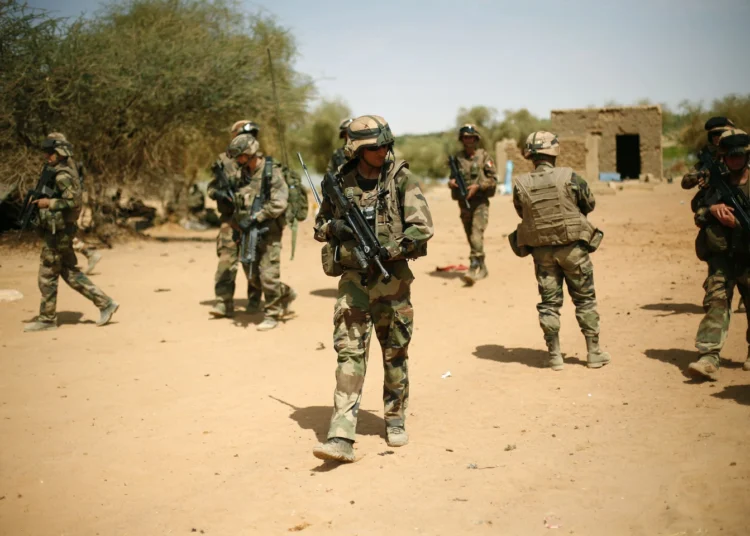 France Faces Waning Influence In Africa 1 French soldiers secure an area where a suicide bomber attacked