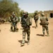 French soldiers secure an area where a suicide bomber attacked