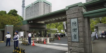 This photo shows an exterior view of the Defense Ministry of Japan with its sign at the main entrance in Tokyo.