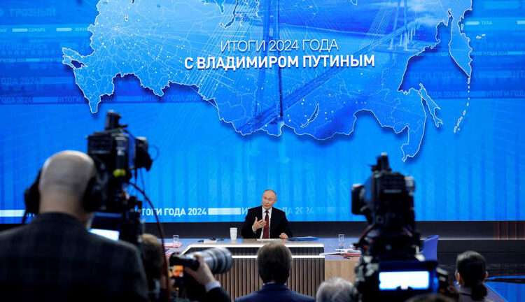 Putin Discloses Plan To Speak To Al-Assad 1 Russia's President, Vladimir Putin speaks during his annual end-of-year press conference in Moscow.