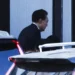 South Korea’s impeached President Yoon Suk-yeol arrives at the Corruption Investigation Office for High-ranking Officials in Gwacheon city, South Korea, on January 15, 2025.