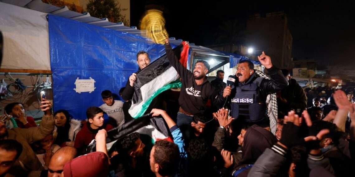 Palestinians react to news of a ceasefire deal in Khan Younis, southern Gaza, on Wednesday.