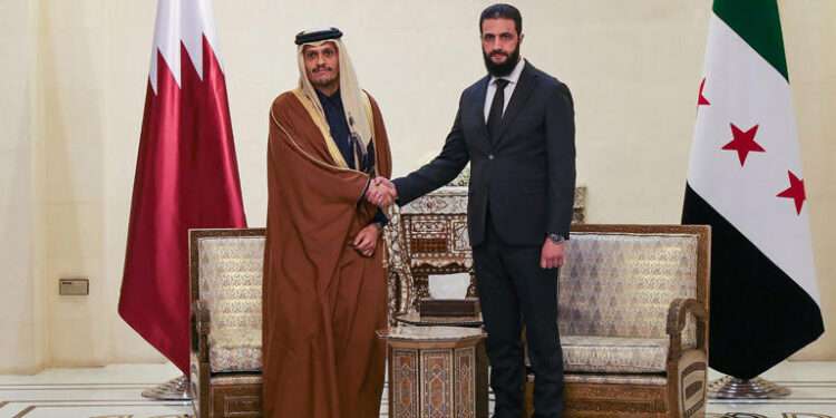 Syria Poised To Welcome UN Forces In Buffer Zone With Israel 1 Syria's new leader, Ahmed al-Sharaa, right, welcomes Qatari Prime Minister Sheikh Mohammed bin Abdulrahman bin Jassim Al Thani in Damascus.